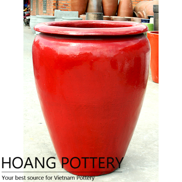 Large red glazed Ceramic planter.