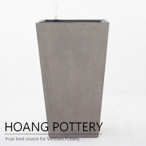 Raw concrete tapered square planters