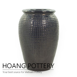 Brown ceramic vase planter for garden