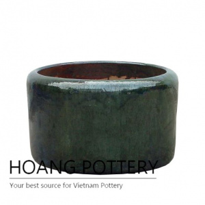 Burnt green low round ceramic planter