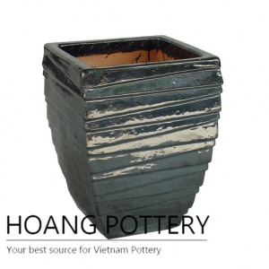 Glossy black slash ceramic pot