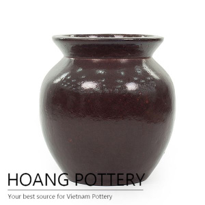 Small red ceramic urn planter