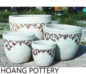 The difference comes from the white ceramic planters!