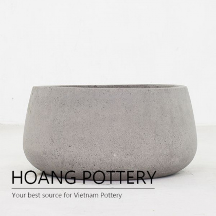 Raw cement low palm planter