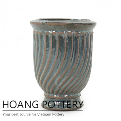 Beautiful antique tornado cup planter