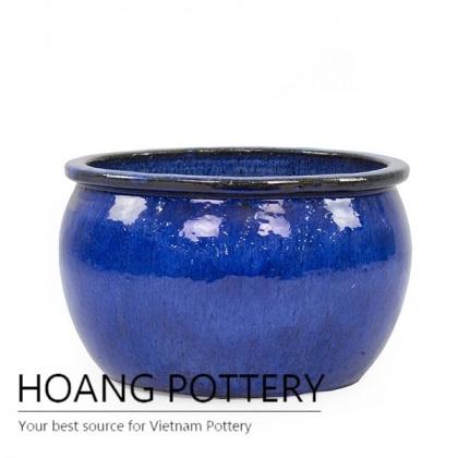 Low round simple ceramic planter