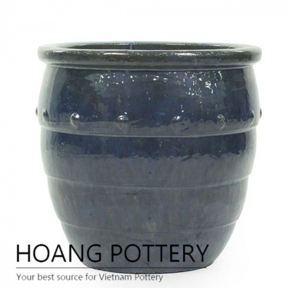 Moss green round ceramic step planter