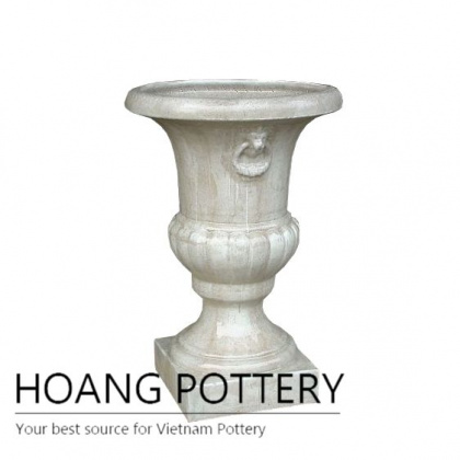 Tall white ceramic garden cup